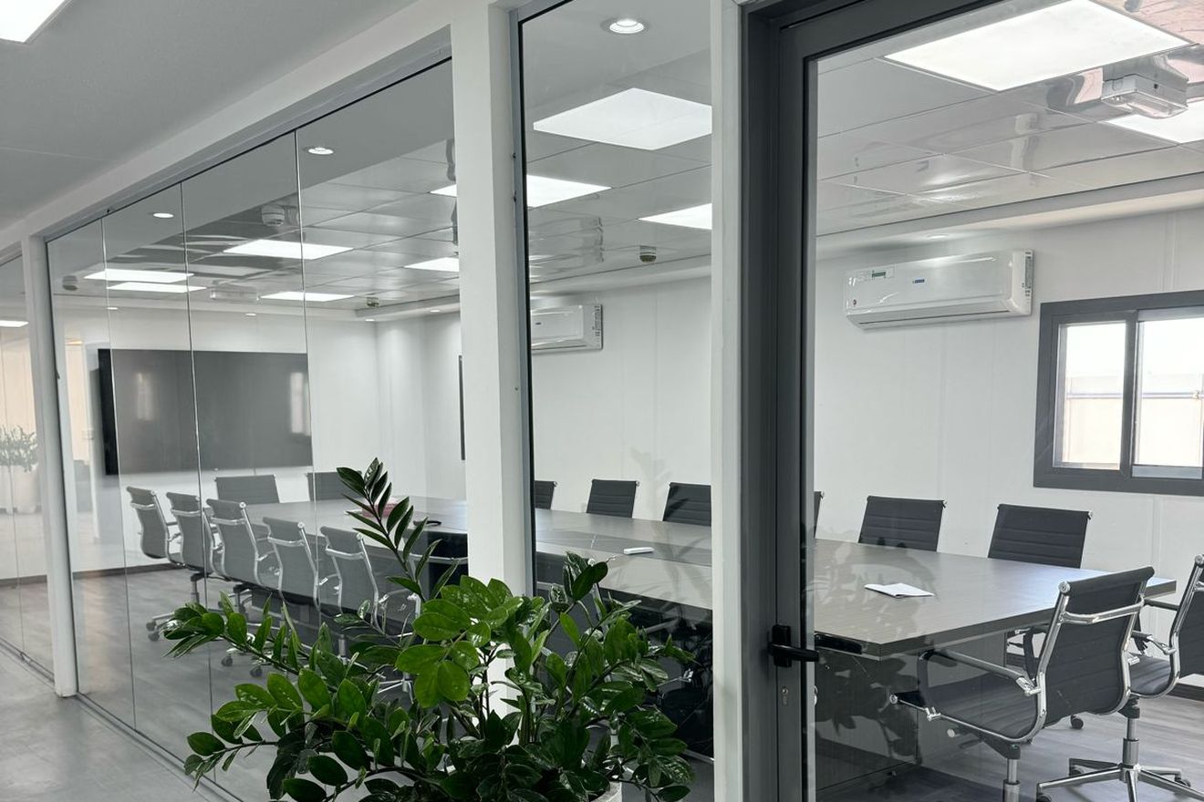 Glazed boardroom off the corridor