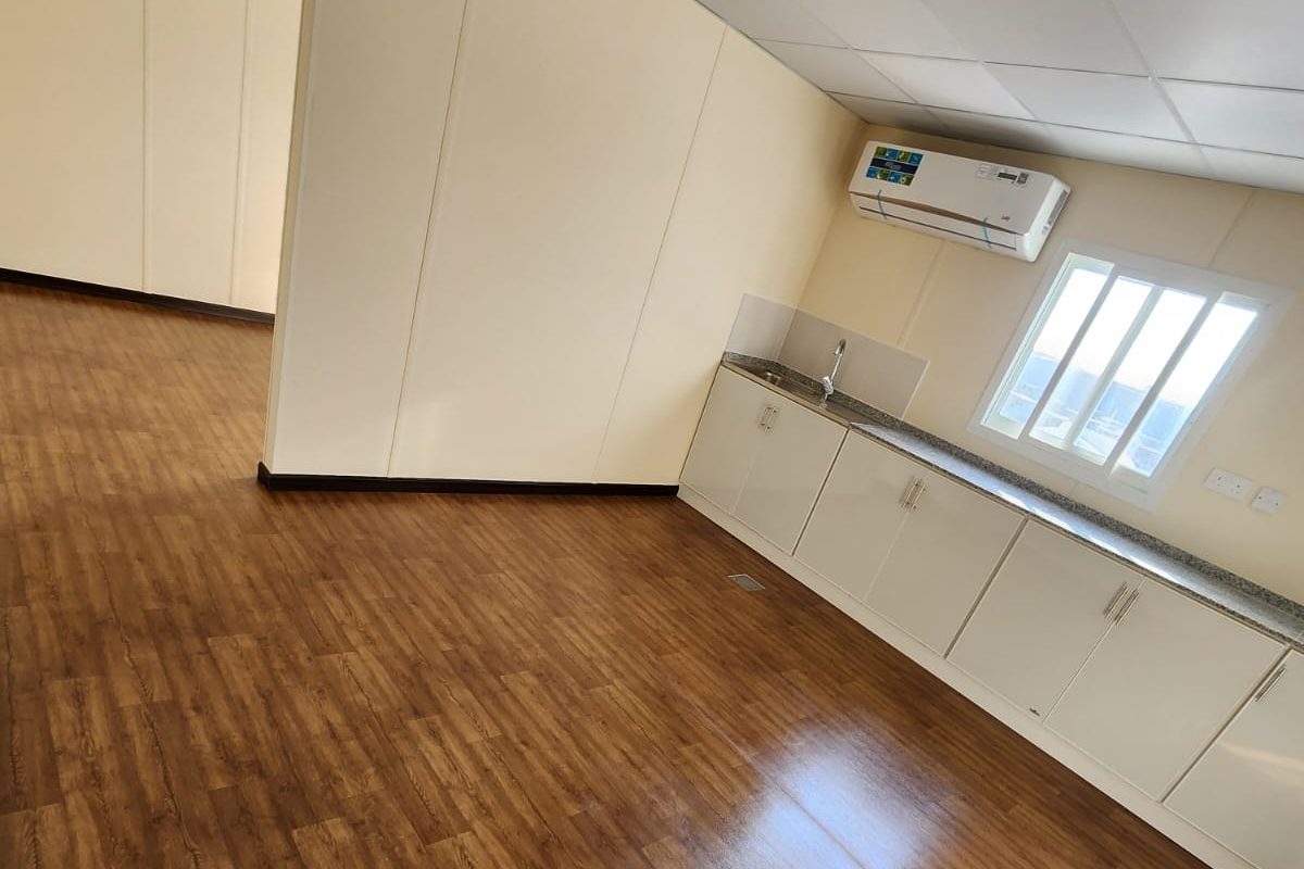 Open area with partition and counter run