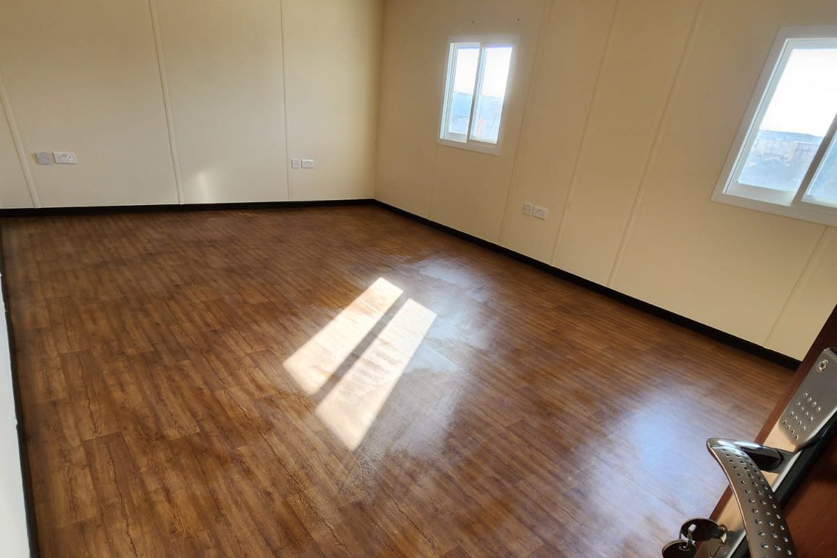Private office, panel walls and vinyl plank floor