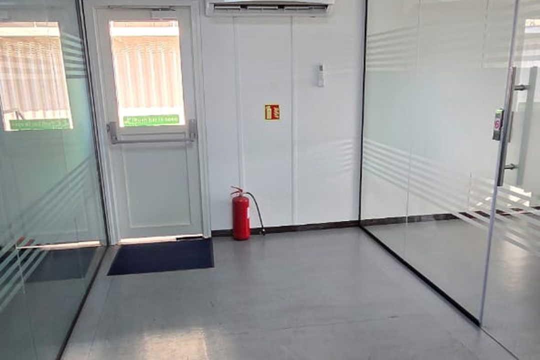 Entrance lobby with glazed partitions and fire point